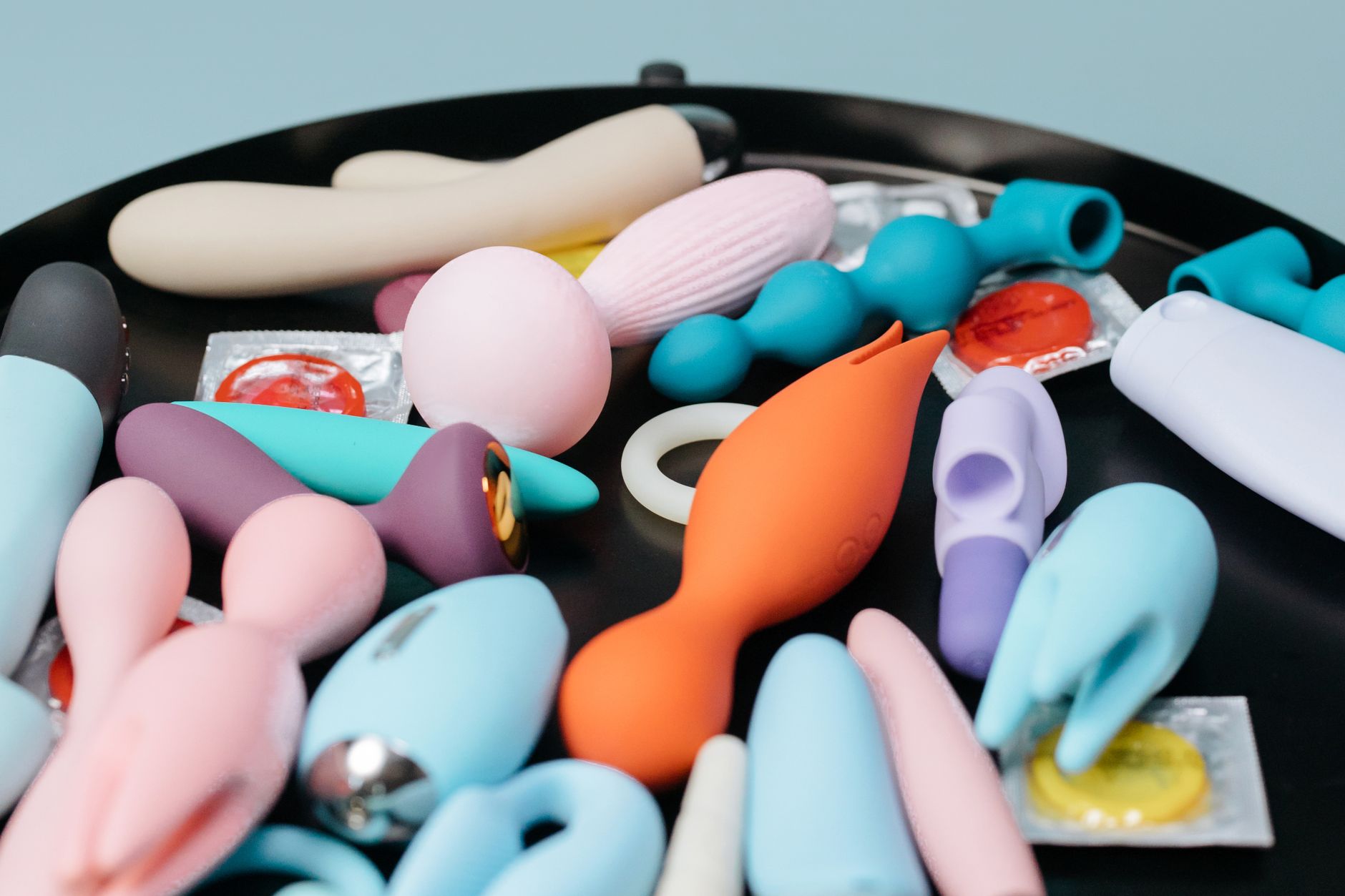 Fresh yellow lemons on a pastel green background, symbolizing renewal and recalibration